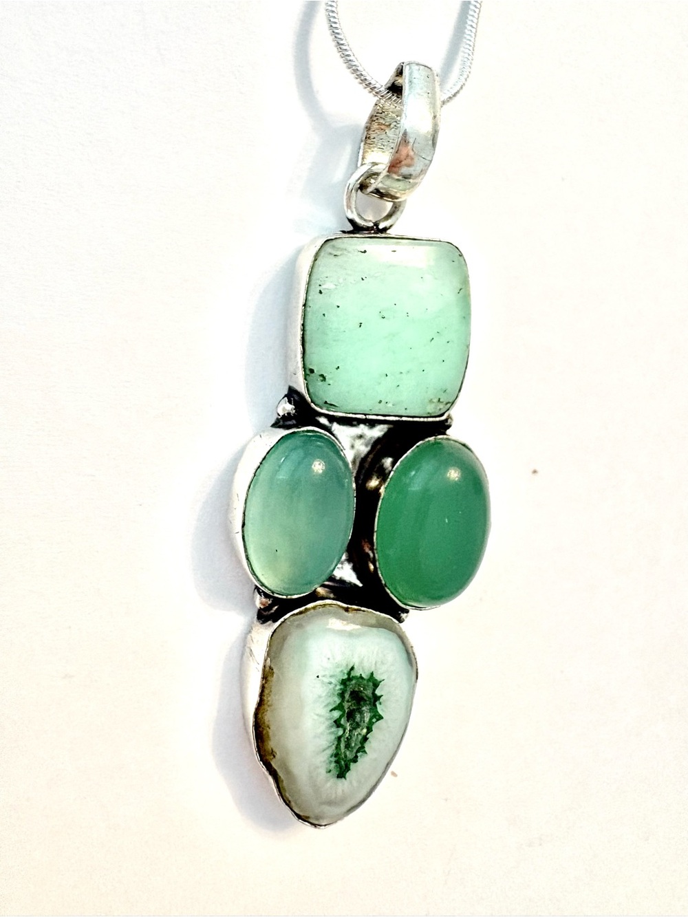 Gorgeous Solar Agate and Green Onyx pendant on a silver chain.